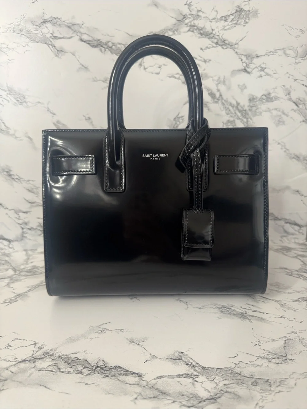 Never used Saint Laurent Nano Sac de Jour Patent Leather Top Handle bag in Black - Picture 1 of 10